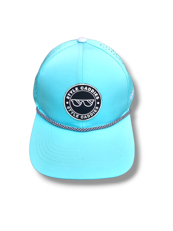 blue golf hat with rope and logo with cement under