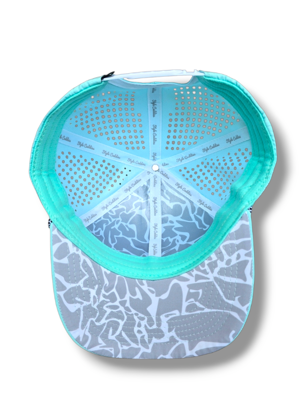 light blue golf hat with cement pattern and logo with rope