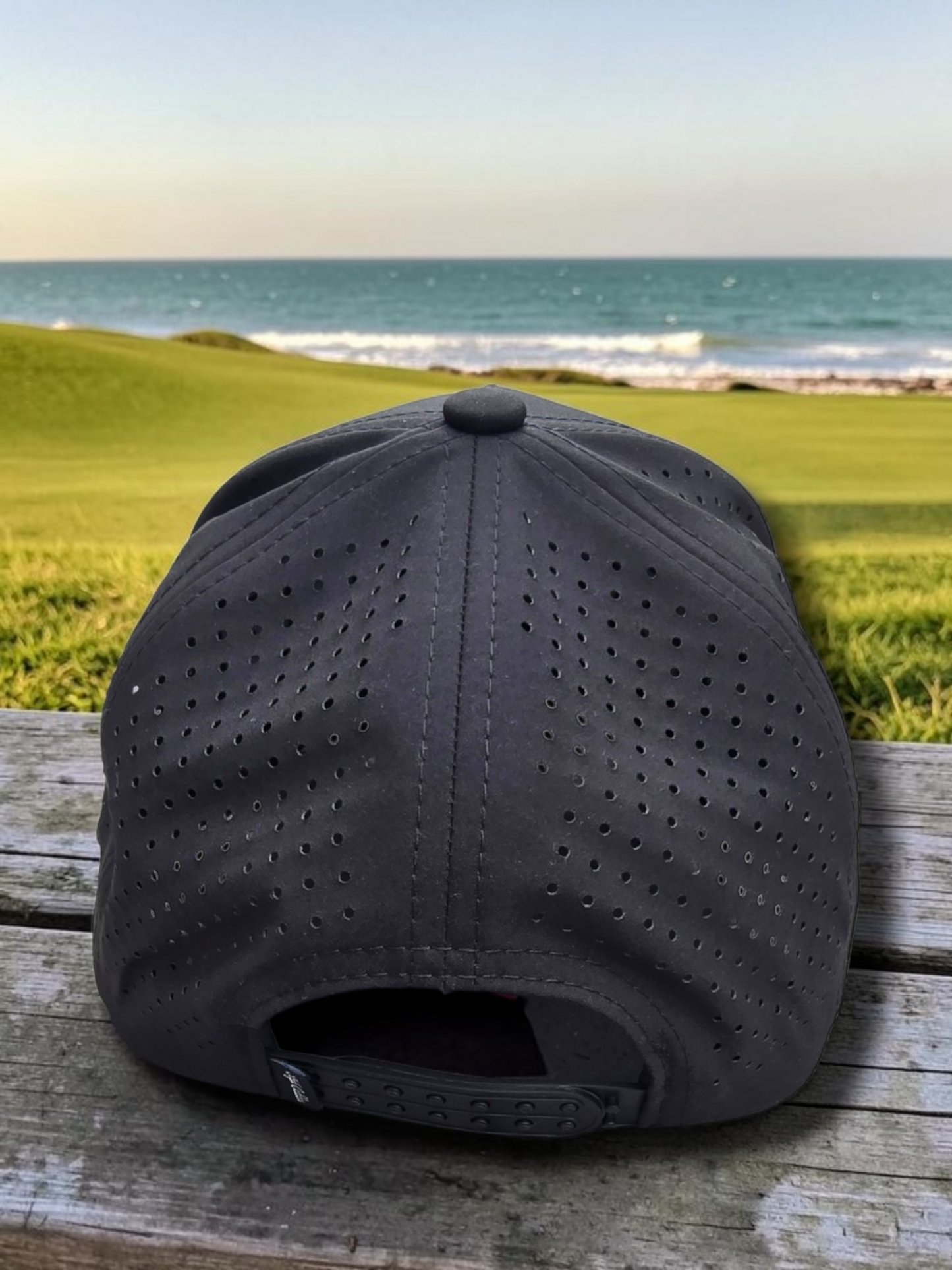 Black Style Caddies hat front view on a white background