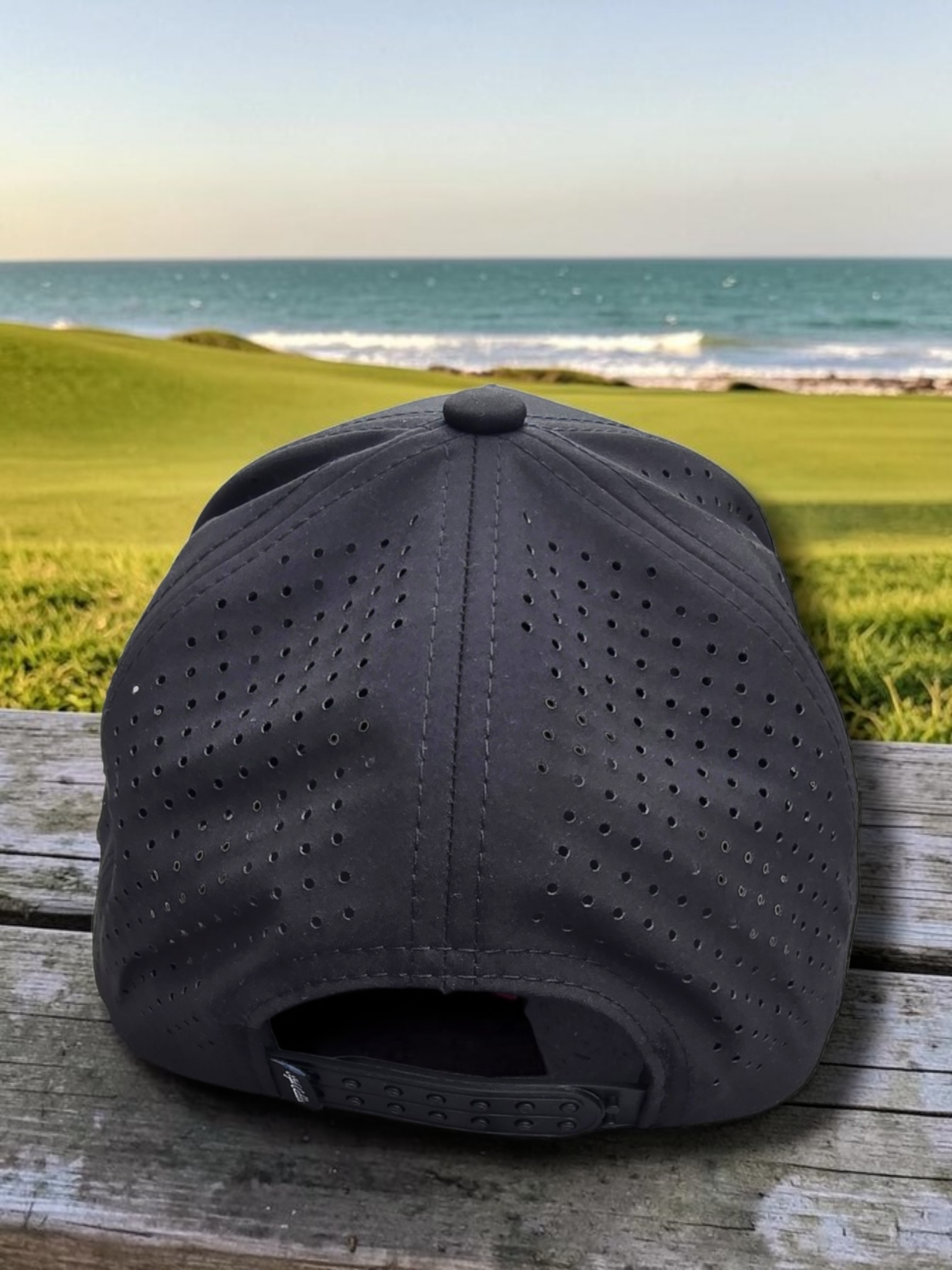 Black Style Caddies hat front view on a white background