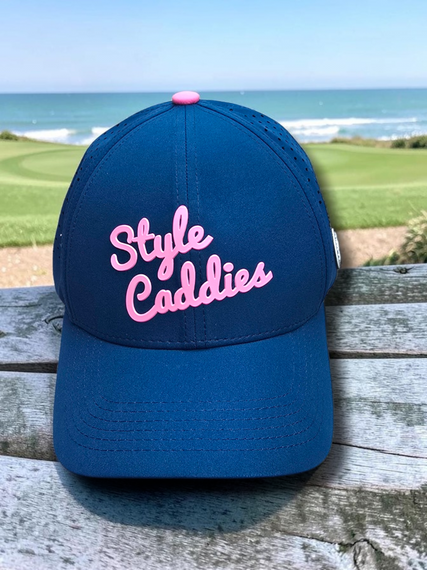 Navy Style Caddies hat front view, angled, on a white background