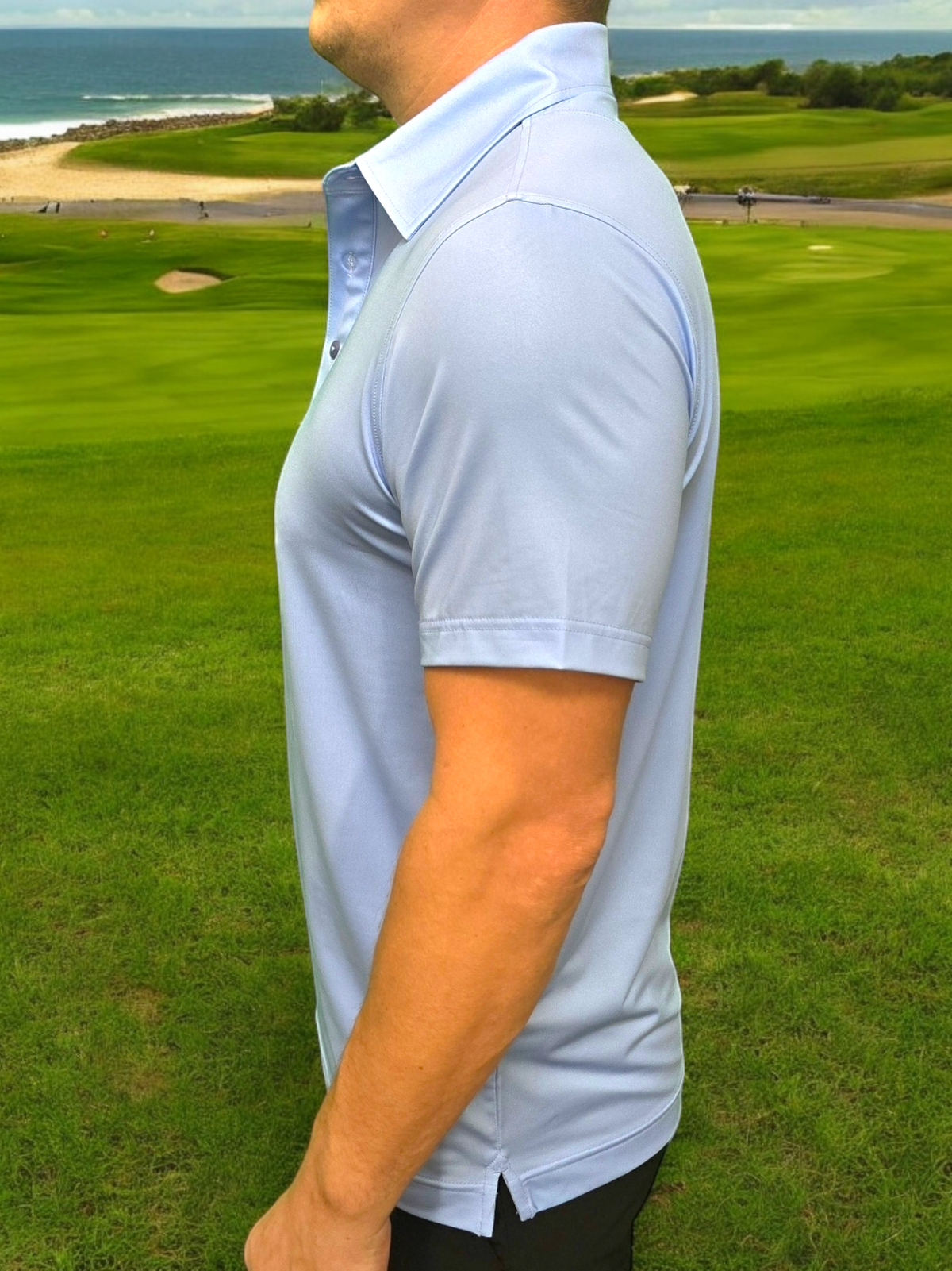 Baby blue golf shirt on course product view