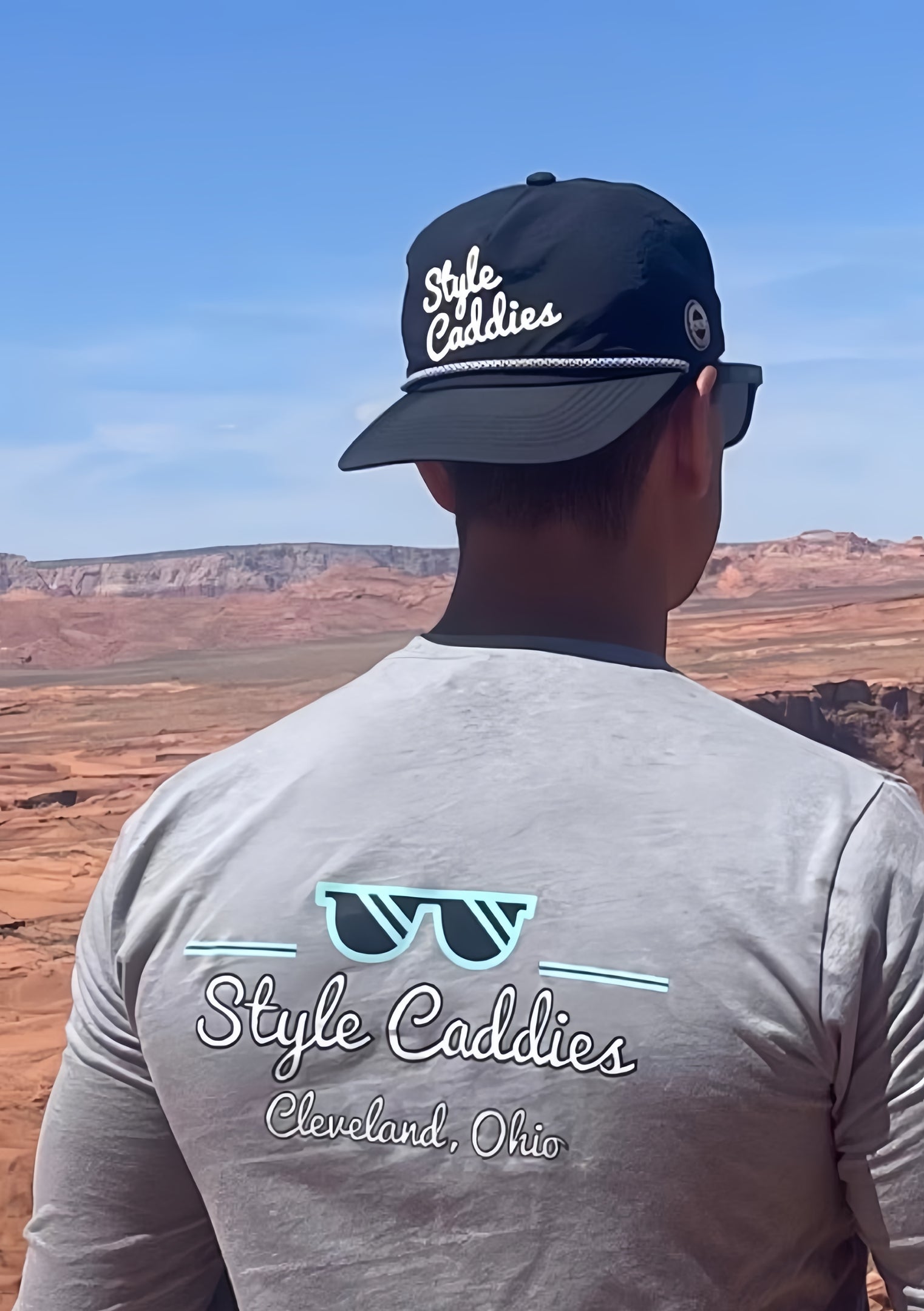 Black nylon golf hat lifestyle shot on course
