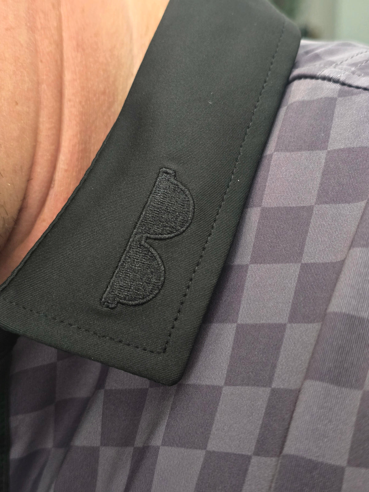 Style Caddies checkered polo shirt detail
