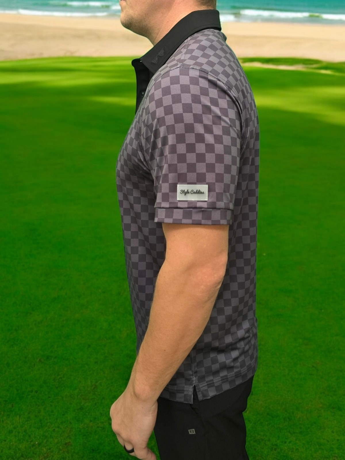 Checkered golf shirt on course product view