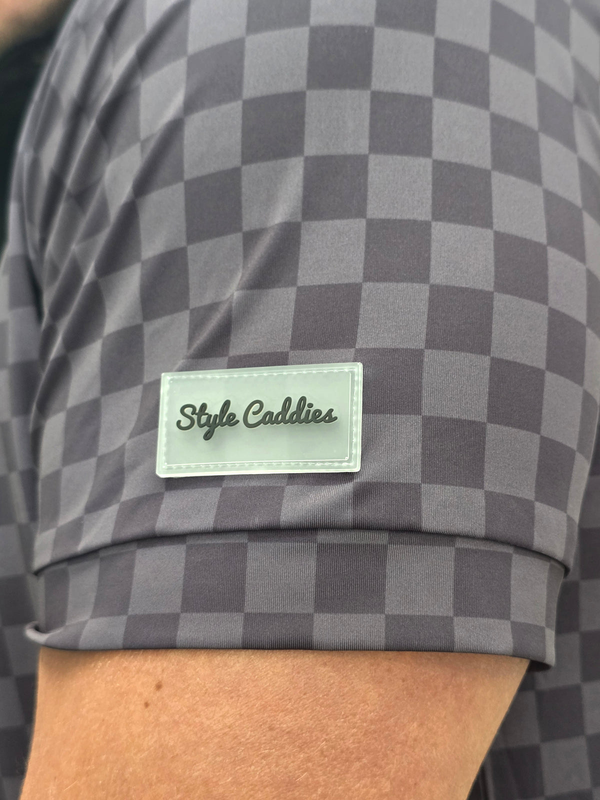 Checkered polo shirt worn on golf course