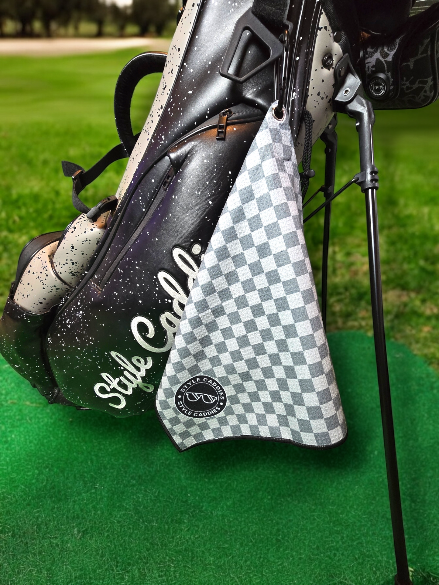 Checkers magnetic golf towel hanging on golf bag