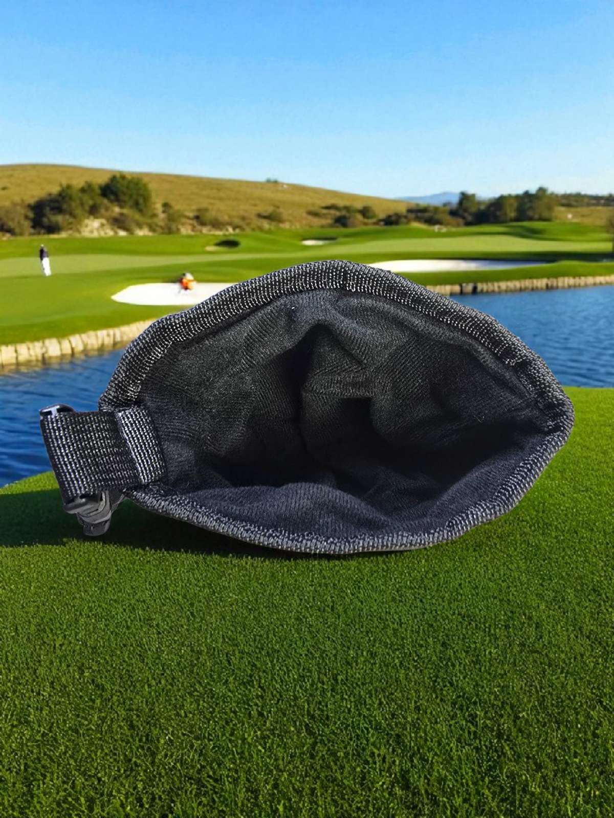 Golf club and ball cleaning pouch lifestyle shot