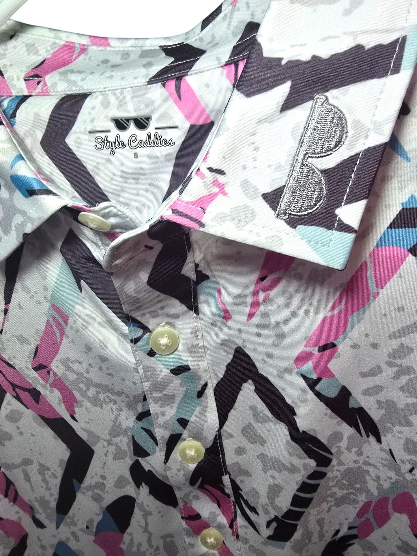 Diamonds golf polo shirt worn on course