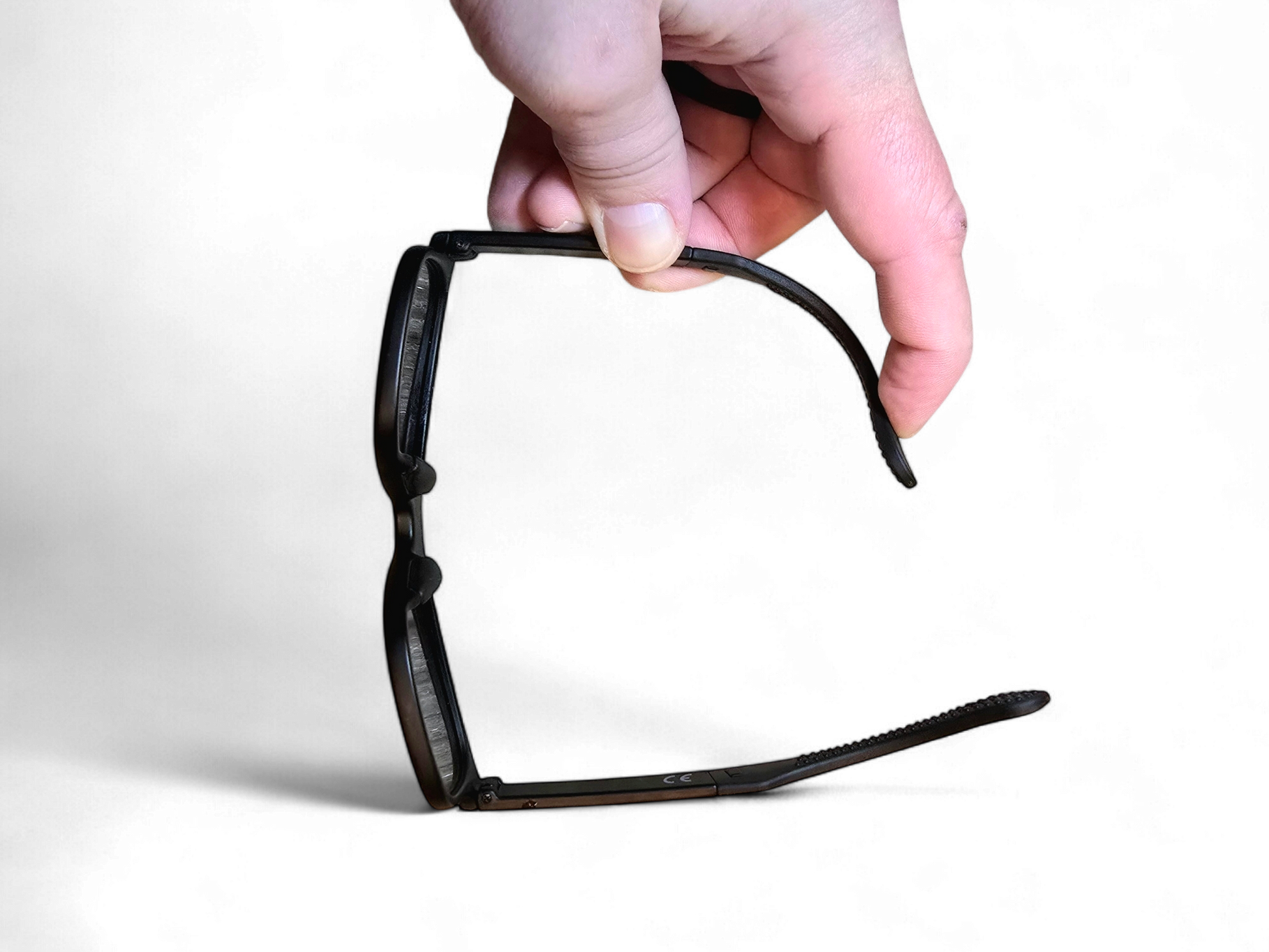 Style Caddies sharp black golf sunglasses close up