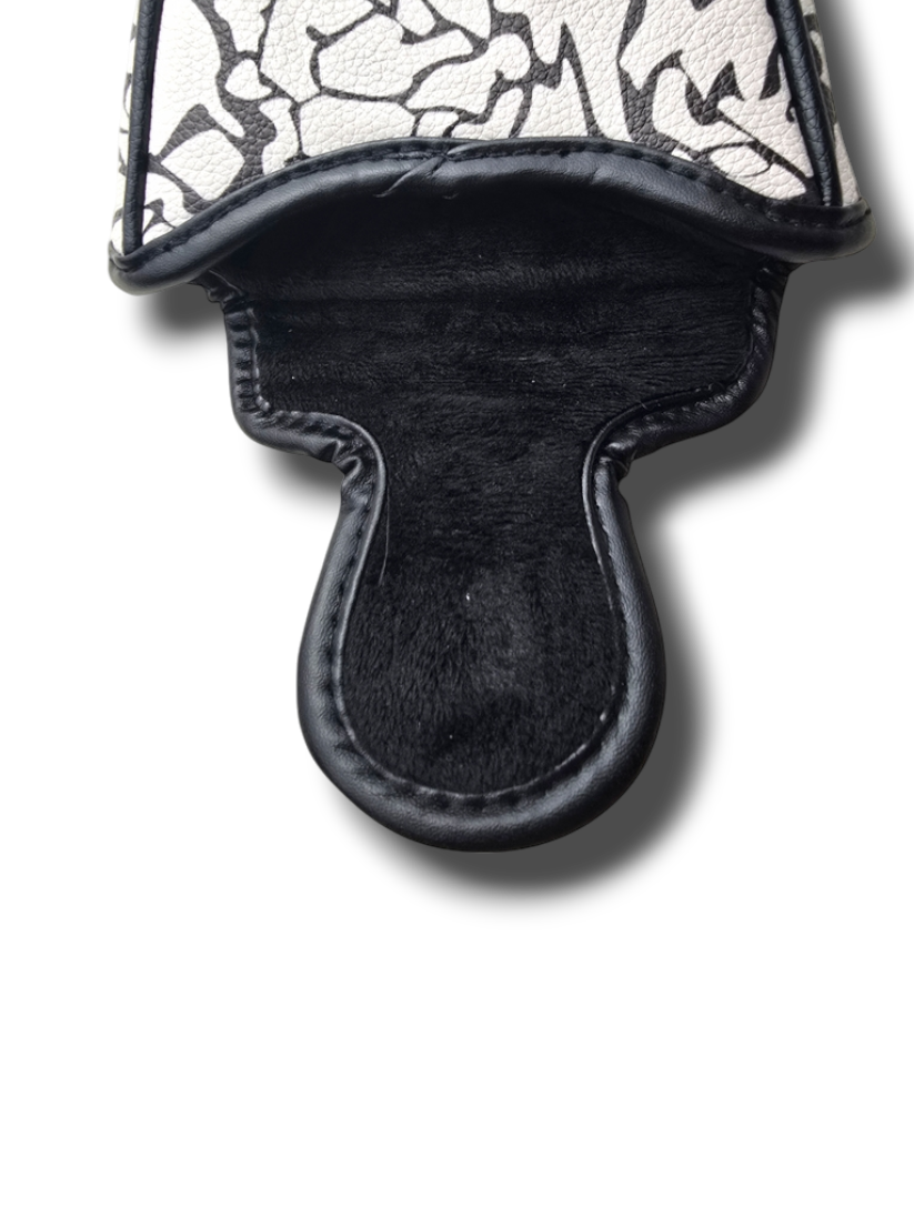 Grey cement mallet golf headcover close up
