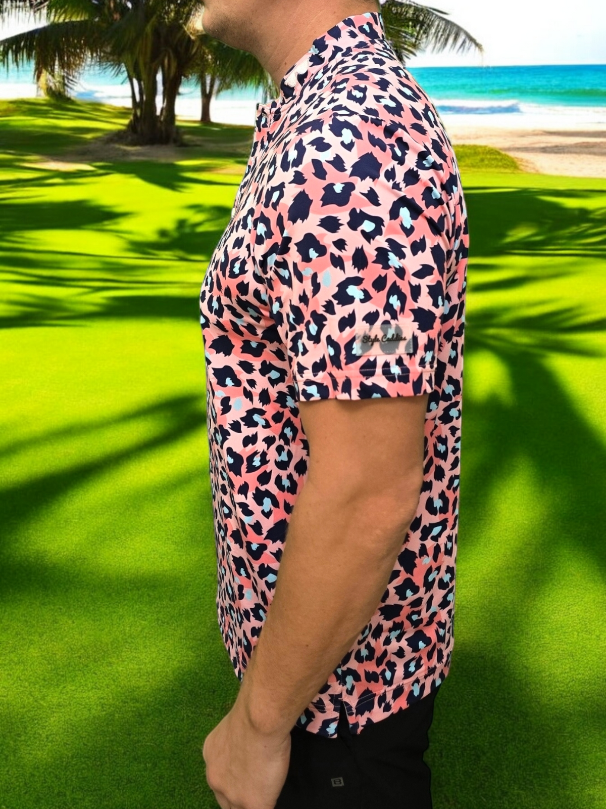 Pink leopard golf shirt on course product view