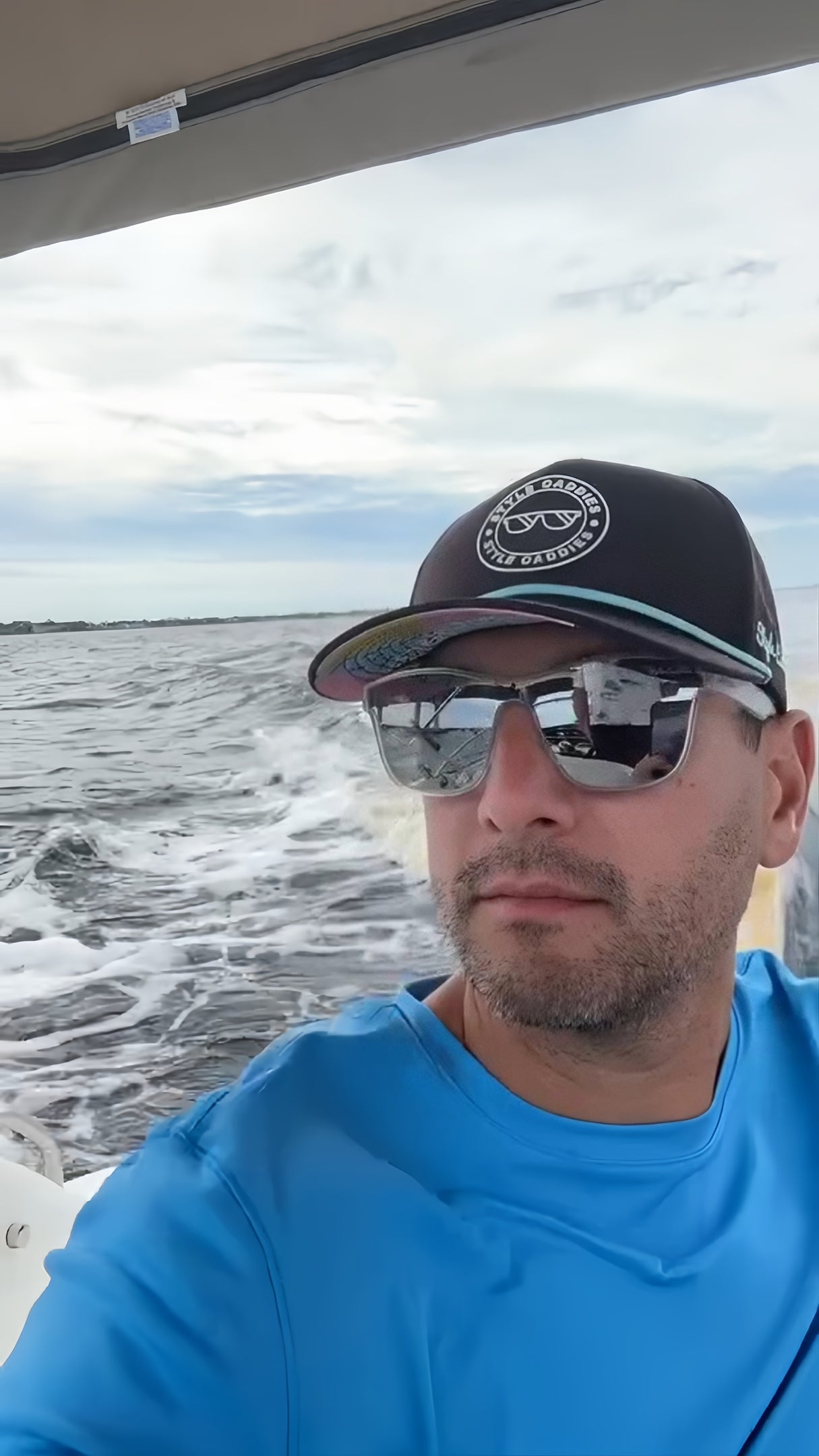 waterproof black rope hat with logo and colors underneath